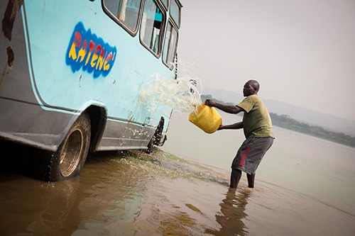 Man washing car in Kenya